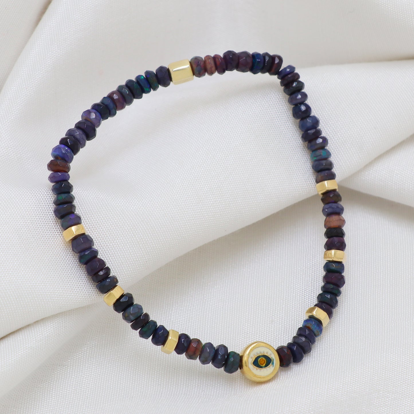 Blue Opal evil eye charm stretch bracelet with blue, yellow and white enamel in gold plated 925 sterling silver