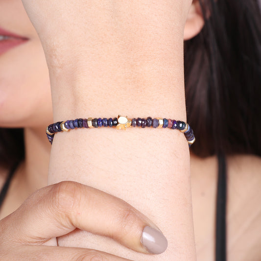 Blue Opal Turtle charm stretch bracelet with  white enamel in gold plated 925 sterling silver.