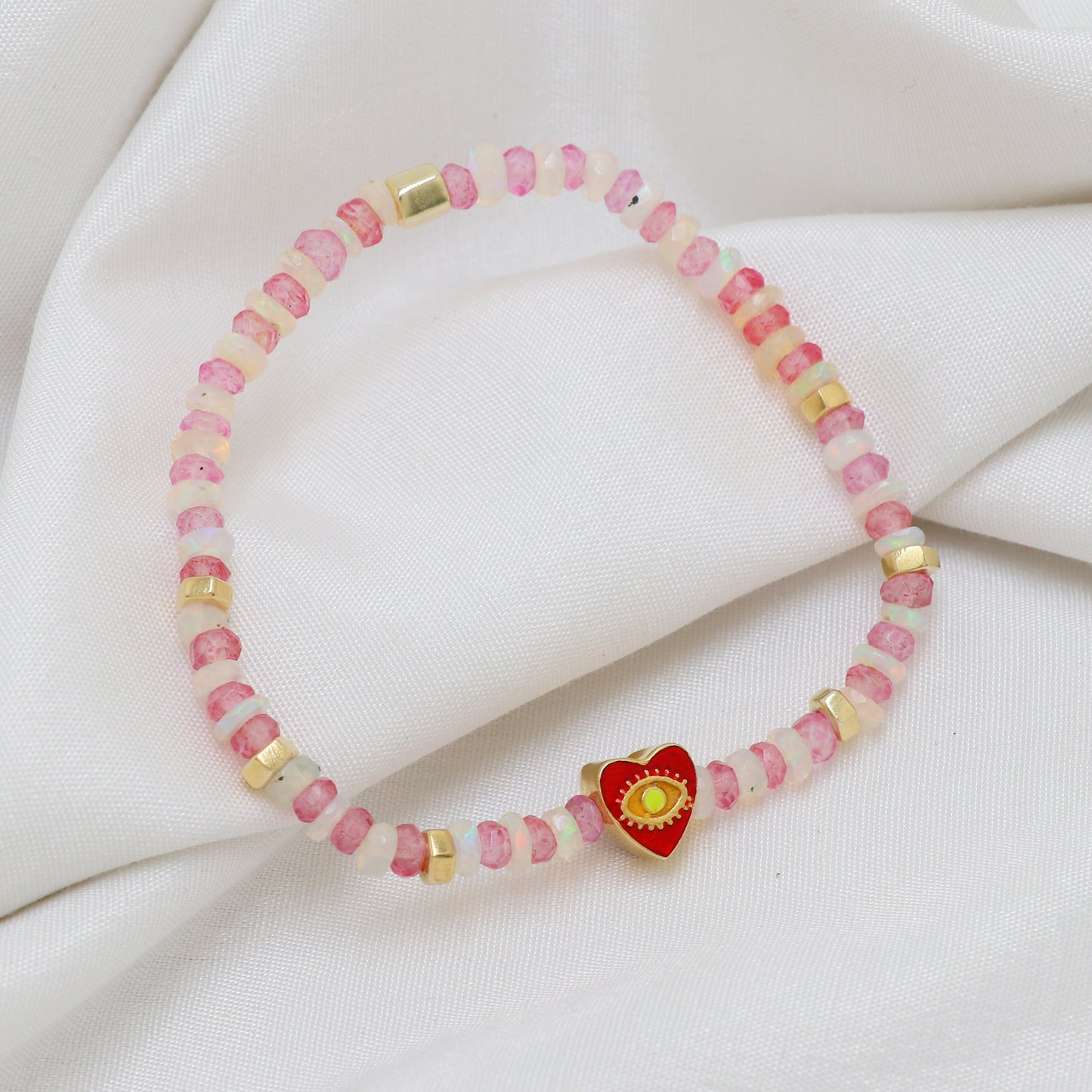 Pink Quartz White Opal Heart And Evil Eye charm stretch bracelet with red and yellow enamel in gold plated 925 sterling silver