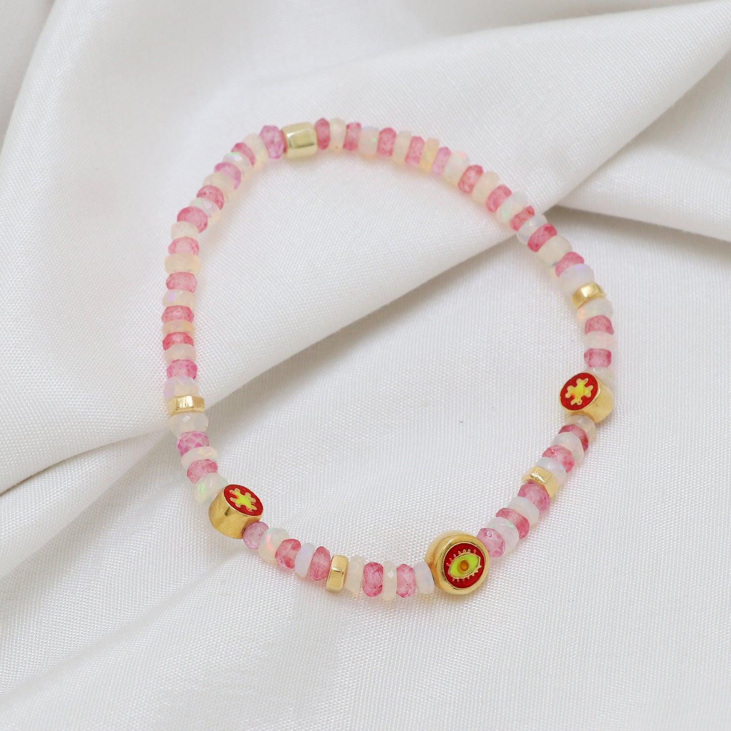 Pink Quartz White Opal Flower And Evil Eye charm stretch bracelet with red, green and yellow enamel in gold plated 925 sterling silver