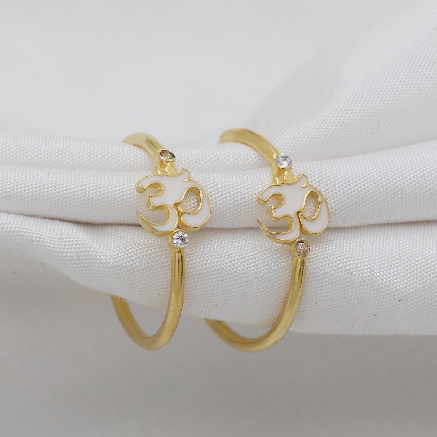 Spiritual OM hoop earrings in gold plated 925 sterling silver with White enamel