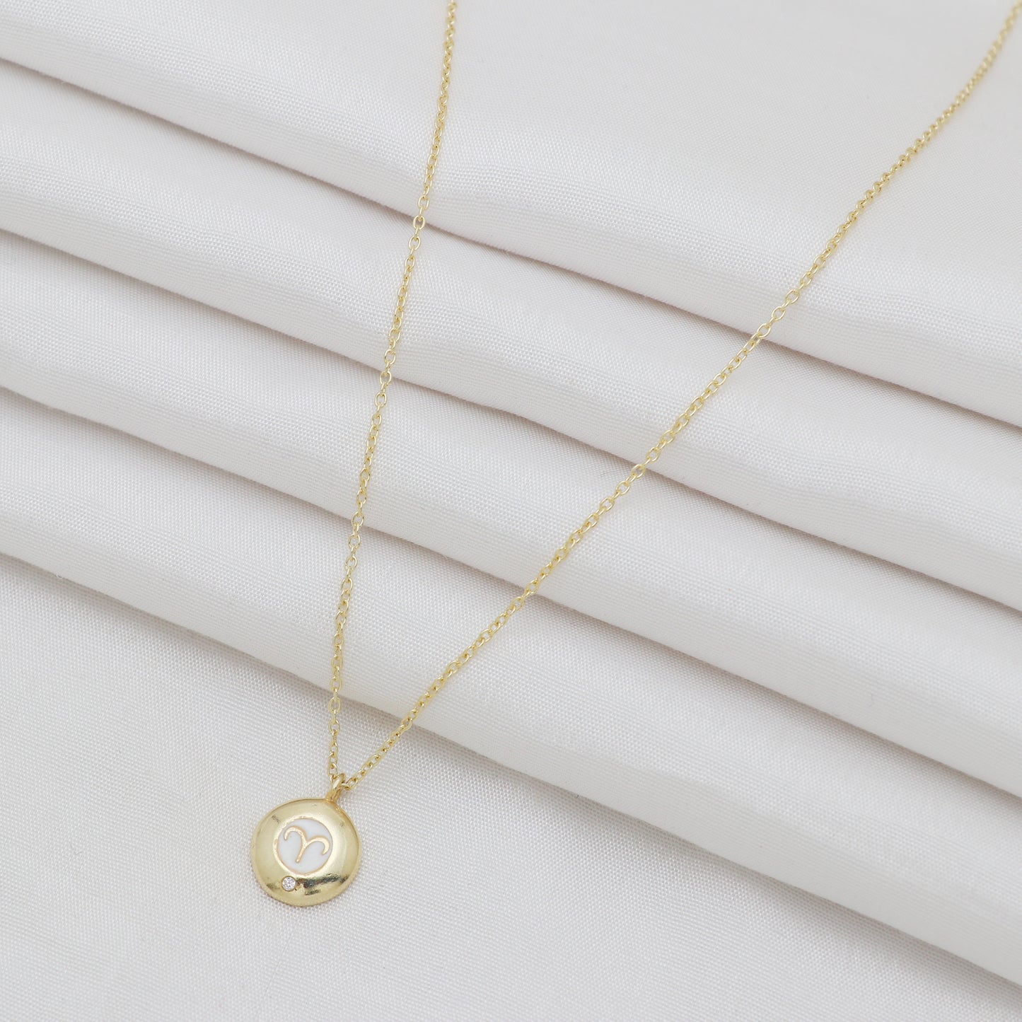 Aries Zodiac Sign chain necklace with white enamel and Zircon birthstone in 22k gold plated 925 sterling silver