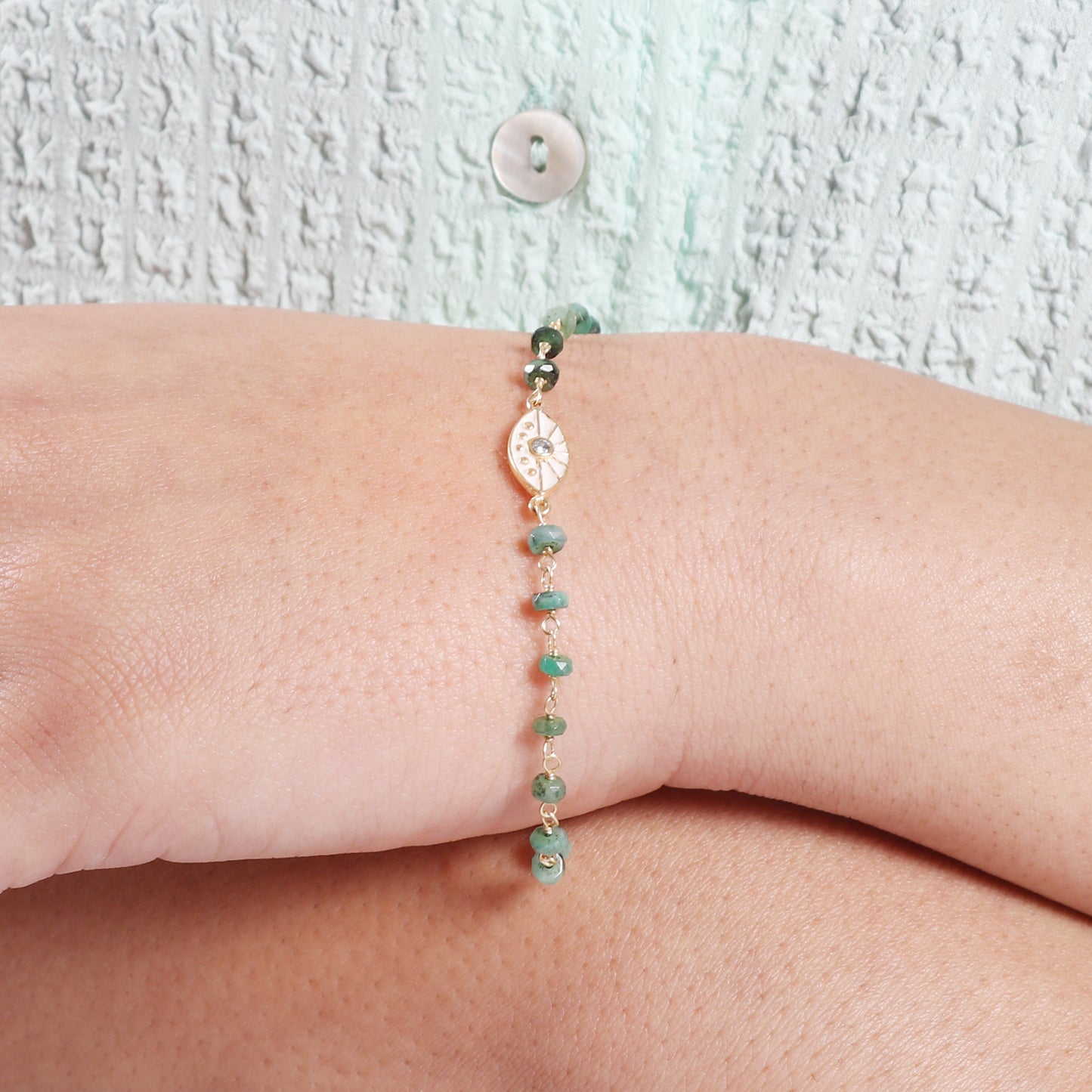 Emerald evil eye charm rosary bracelet with white enamel and zircon stone in gold plated 925 sterling silver