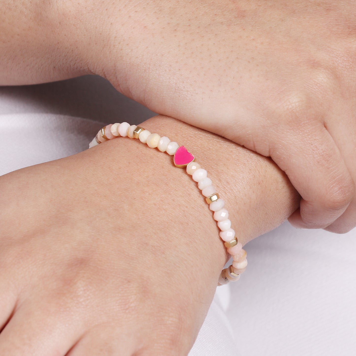 Pink opal heart charm stretch bracelet with pink enamel in gold plated 925 sterling silver