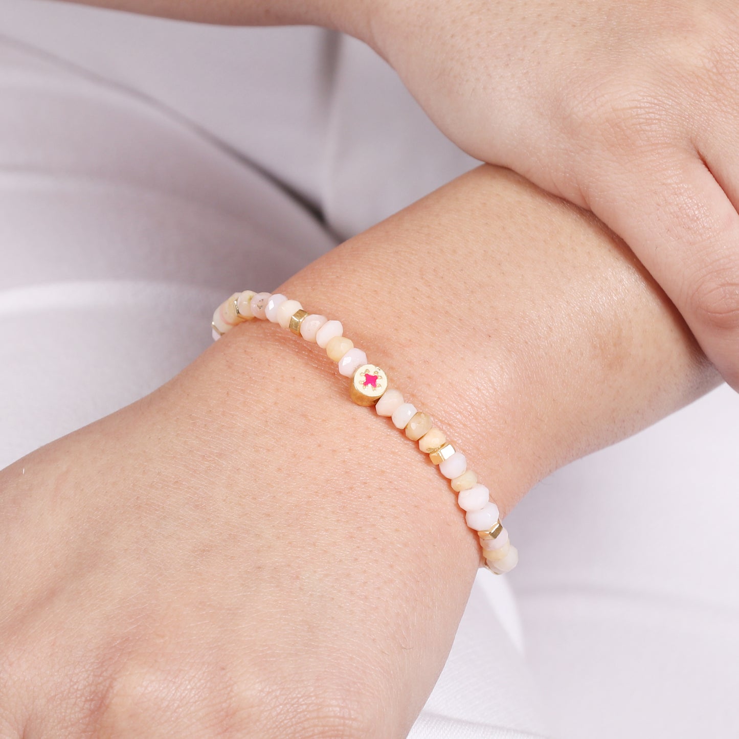 Pink opal flower charm stretch bracelet with pink and white enamel in gold plated 925 sterling silver