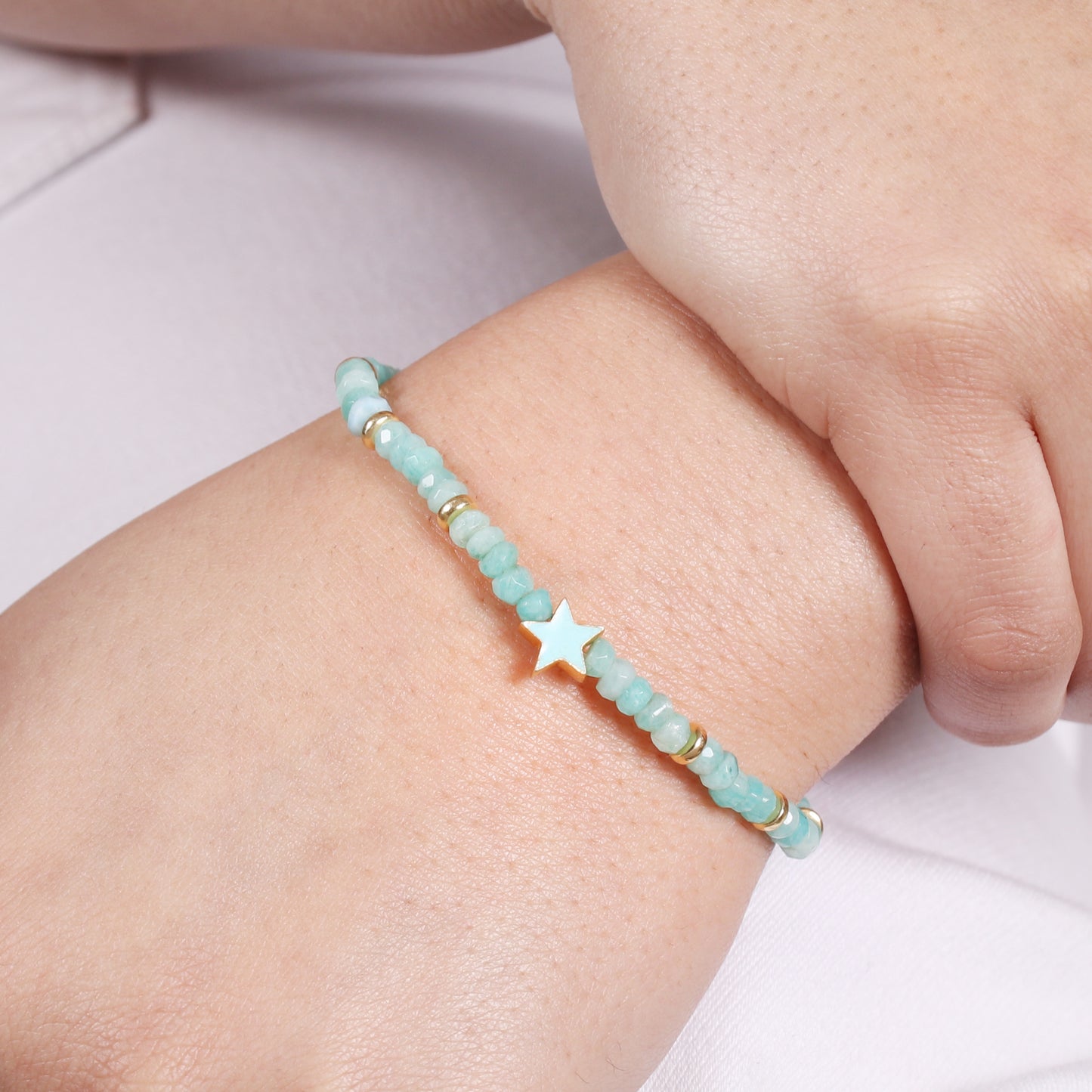 Amazonite star charm stretch bracelet with blue enamel and in gold plated 925 sterling silver