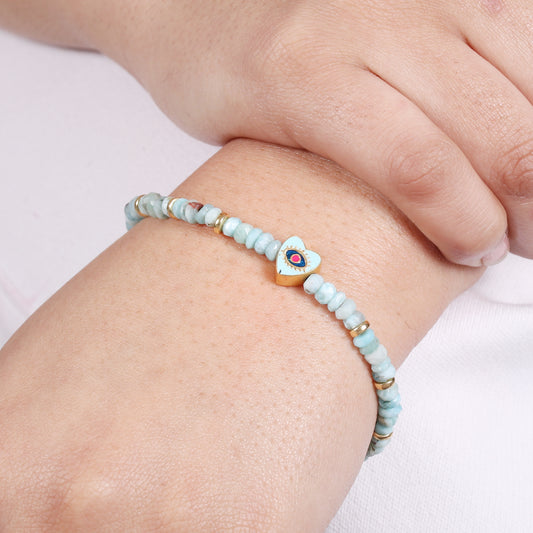 Larimar heart and evil eye charm stretch bracelet with blue and red enamel in gold plated 925 sterling silver