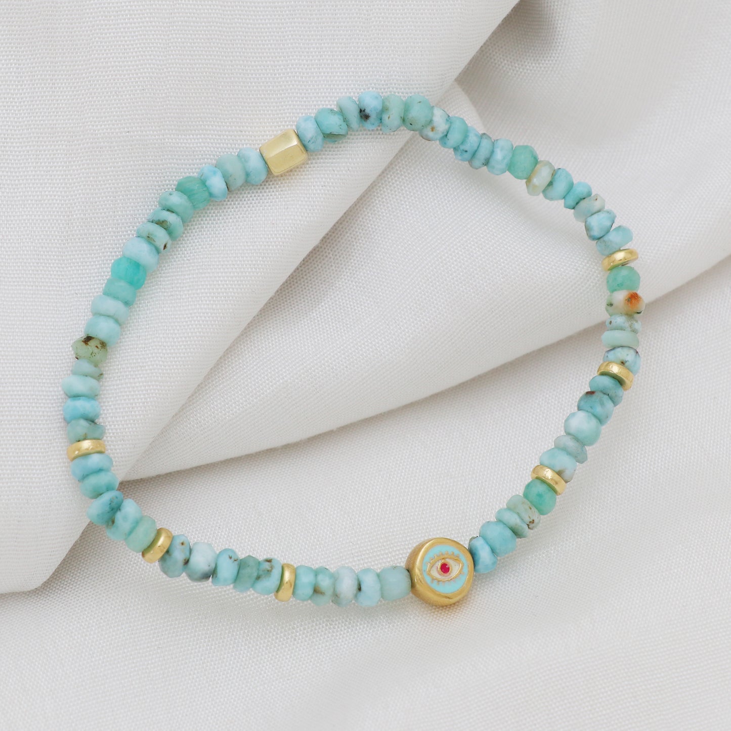 Larimar evil eye charm stretch bracelet with blue,whie and pink enamel in gold plated 925 sterling silver