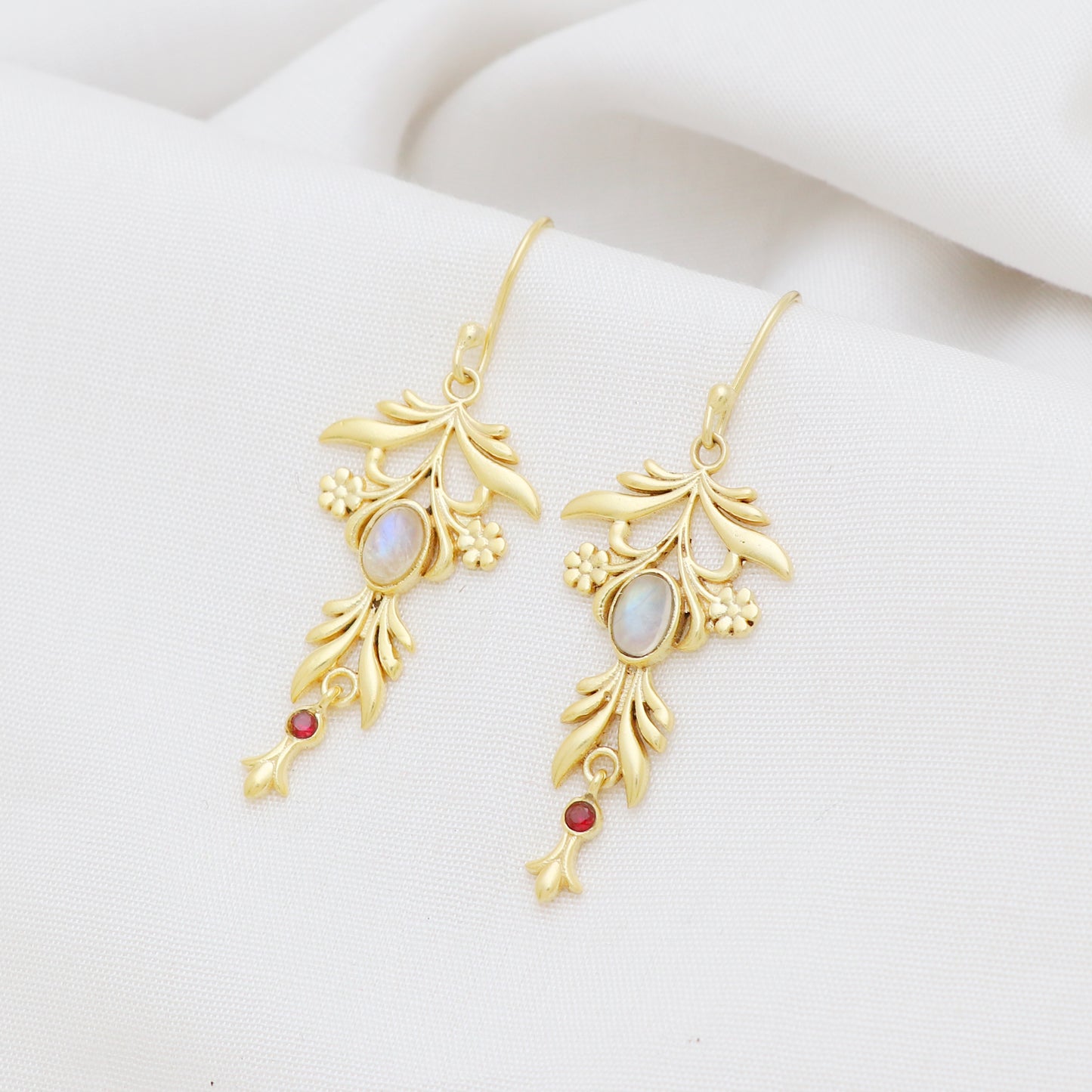 Gold plated 925 sterling silver earrings with garnet and rainbow moonstone gemstone