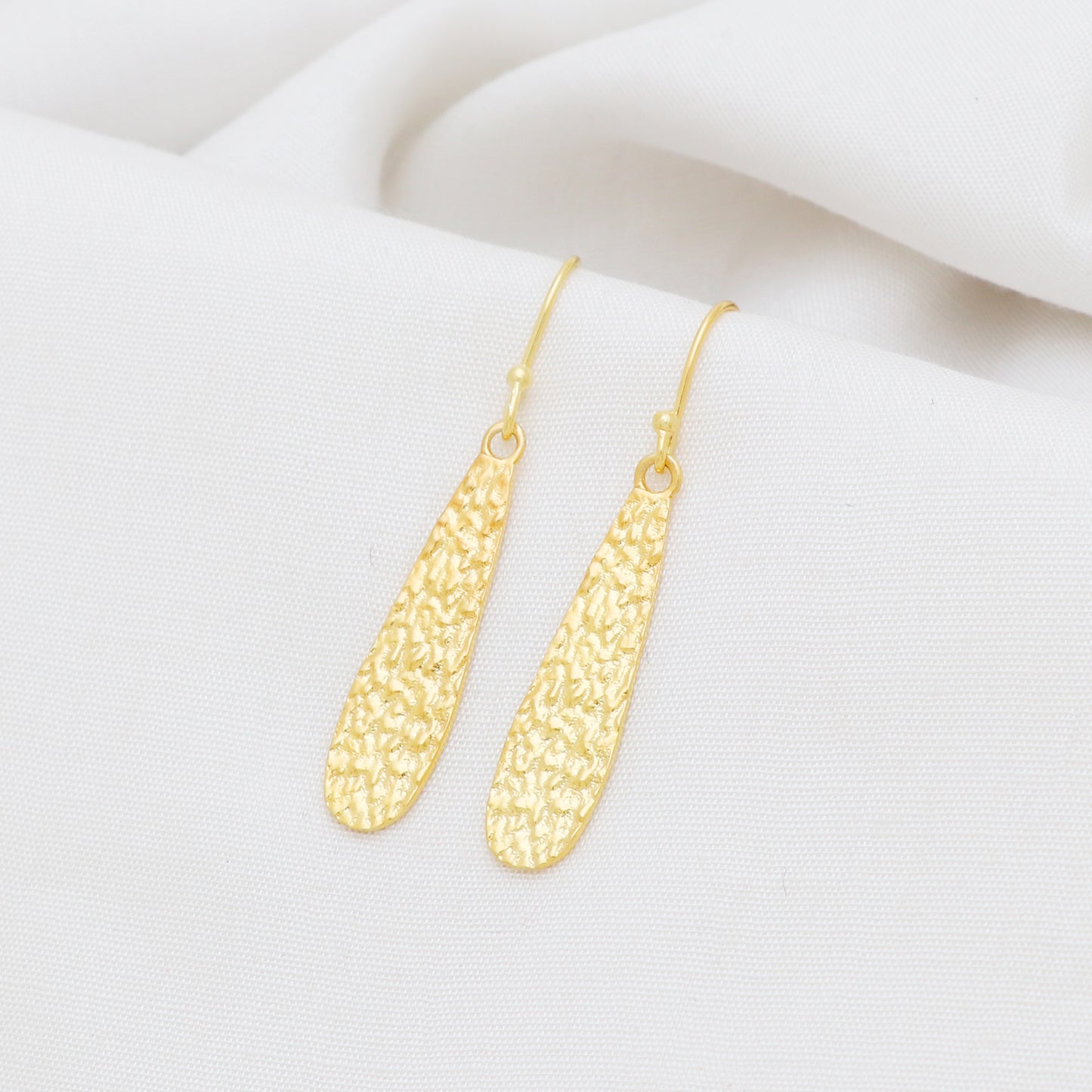 Textured earring in gold plated 925 sterling silver