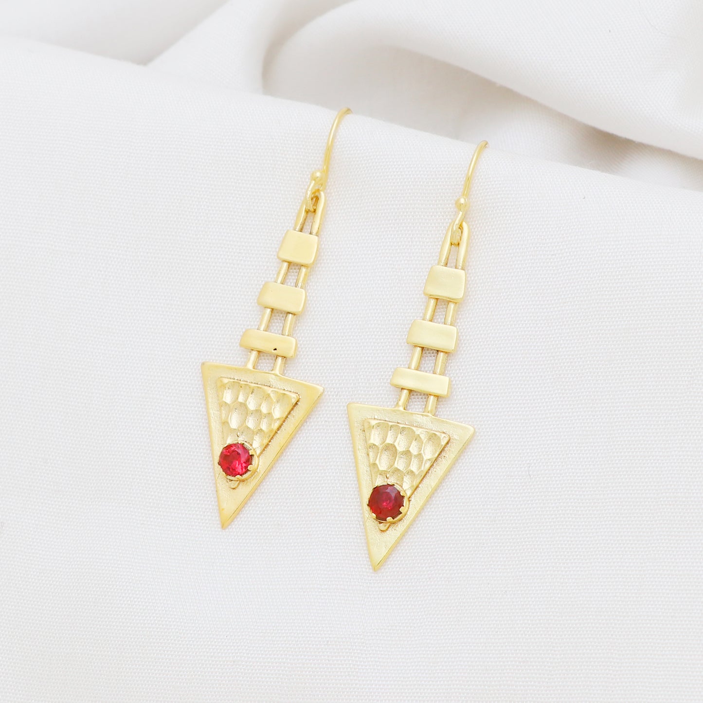 Hammered textured earrings with garnet gemstone in gold plated 925 sterling silver