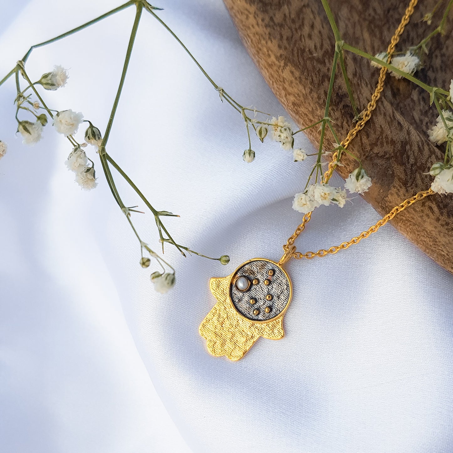 Gemini Zodiac Constellation chain necklace with Hamsa Charm and Pearl birthstone in two tone black rhodium and 22k gold plated 925 sterling silver