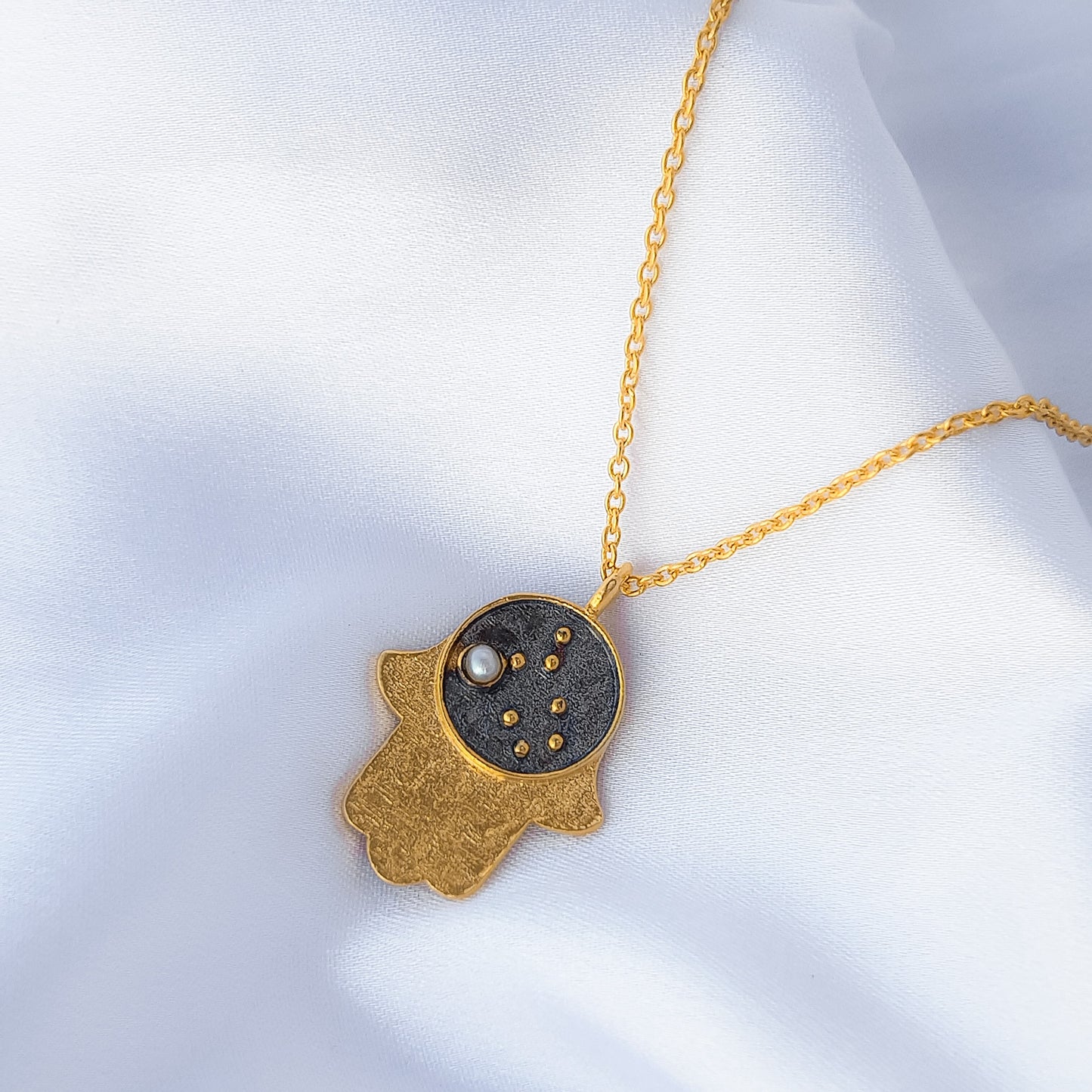 Gemini Zodiac Constellation chain necklace with Hamsa Charm and Pearl birthstone in two tone black rhodium and 22k gold plated 925 sterling silver