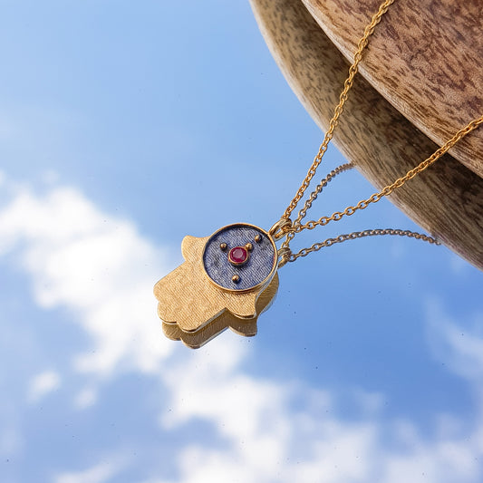Cancer Zodiac Constellation chain necklace with Hamsa Charm and ruby birthstone in two tone black rhodium and 22k gold plated 925 sterling silver