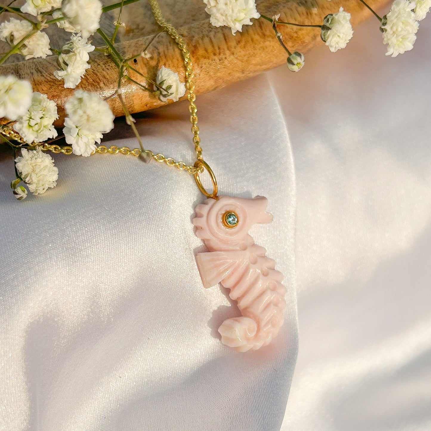 Sea Horse hand-carved pendant in Pink Opal with Blue Topaz gemstone in gold plated Brass chain necklace