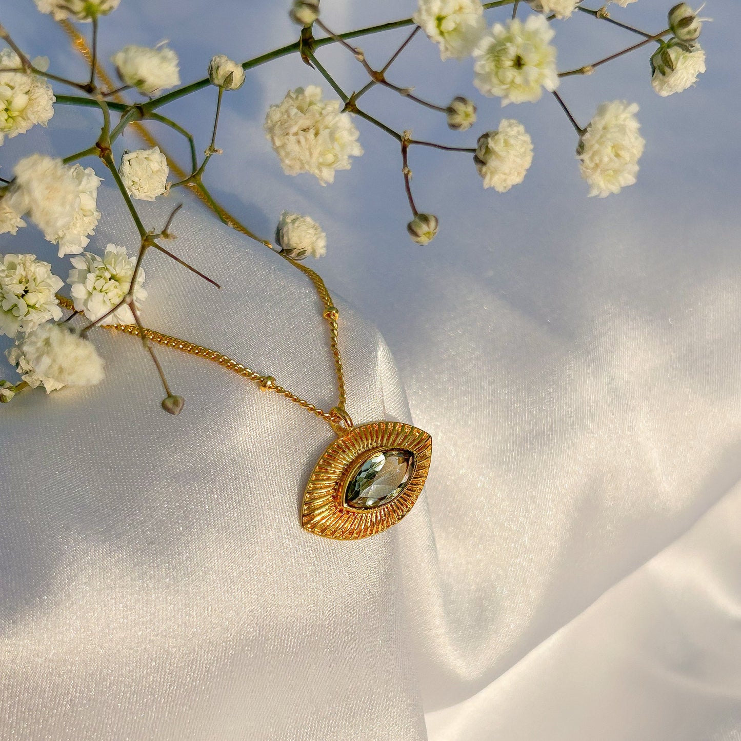 Evil Eye ball chain necklace with Blue Topaz gemstones in gold plated Brass