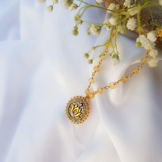 Citrine beaded necklace with Lotus charm and zircon stones in two tone black rhodium and 22k gold plated 925 sterling silver