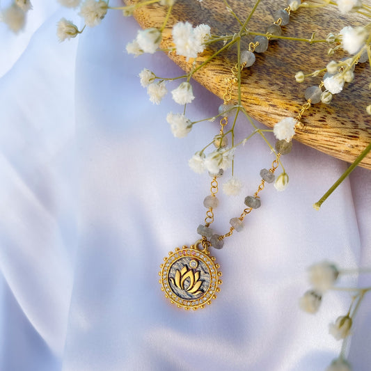 Labradorite beaded necklace with Lotus charm and zircon stones in two tone black rhodium and 22k gold plated 925 sterling silver