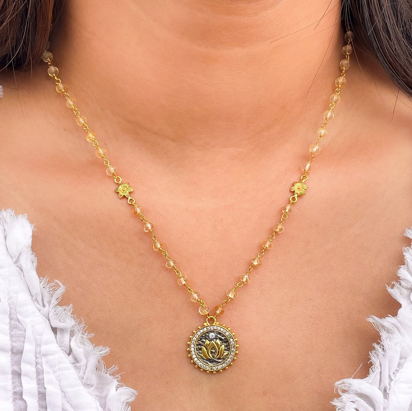Citrine beaded necklace with Lotus charm and zircon stones in two tone black rhodium and 22k gold plated 925 sterling silver