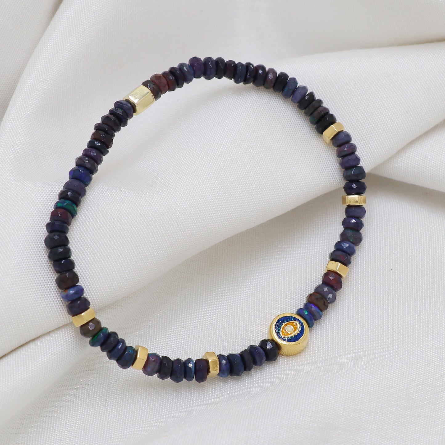 Blue Opal evil eye charm stretch bracelet with blue, yellow and white enamel in gold plated 925 sterling silver