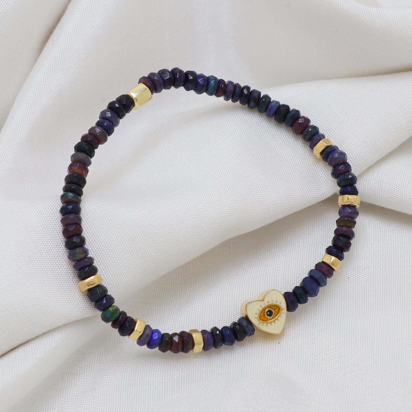 Blue Opal Heart And Evil Eye charm stretch bracelet with blue, yellow and white enamel in gold plated 925 sterling silver