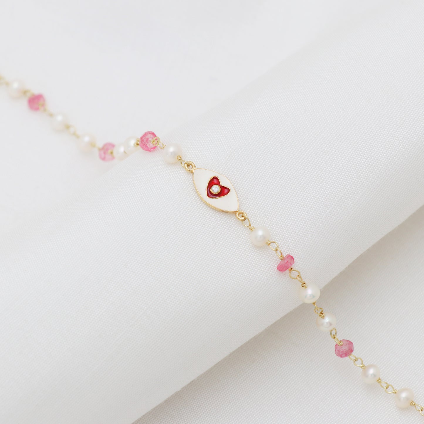 Pearl and pink topaz heart charm rosary bracelet with red and white enamel and zircon stone in gold plated 925 sterling silver