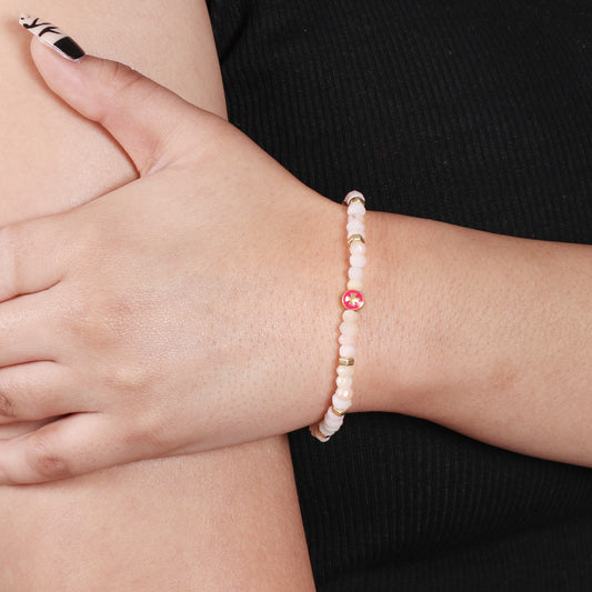 Pink opal flower charm stretch bracelet with pink enamel in gold plated 925 sterling silver