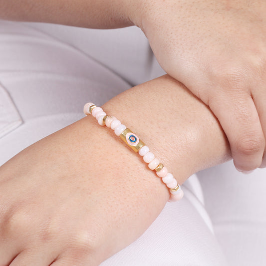 Pink opal evil eye charm stretch bracelet with pink and blue enamel in gold plated 925 sterling silver