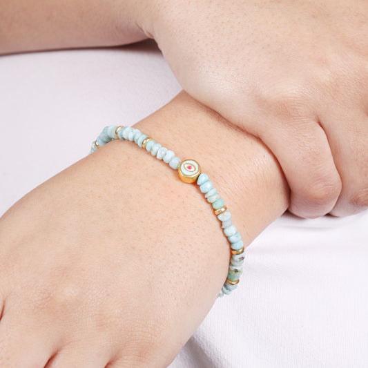 Larimar evil eye charm stretch bracelet with blue,whie and pink enamel in gold plated 925 sterling silver