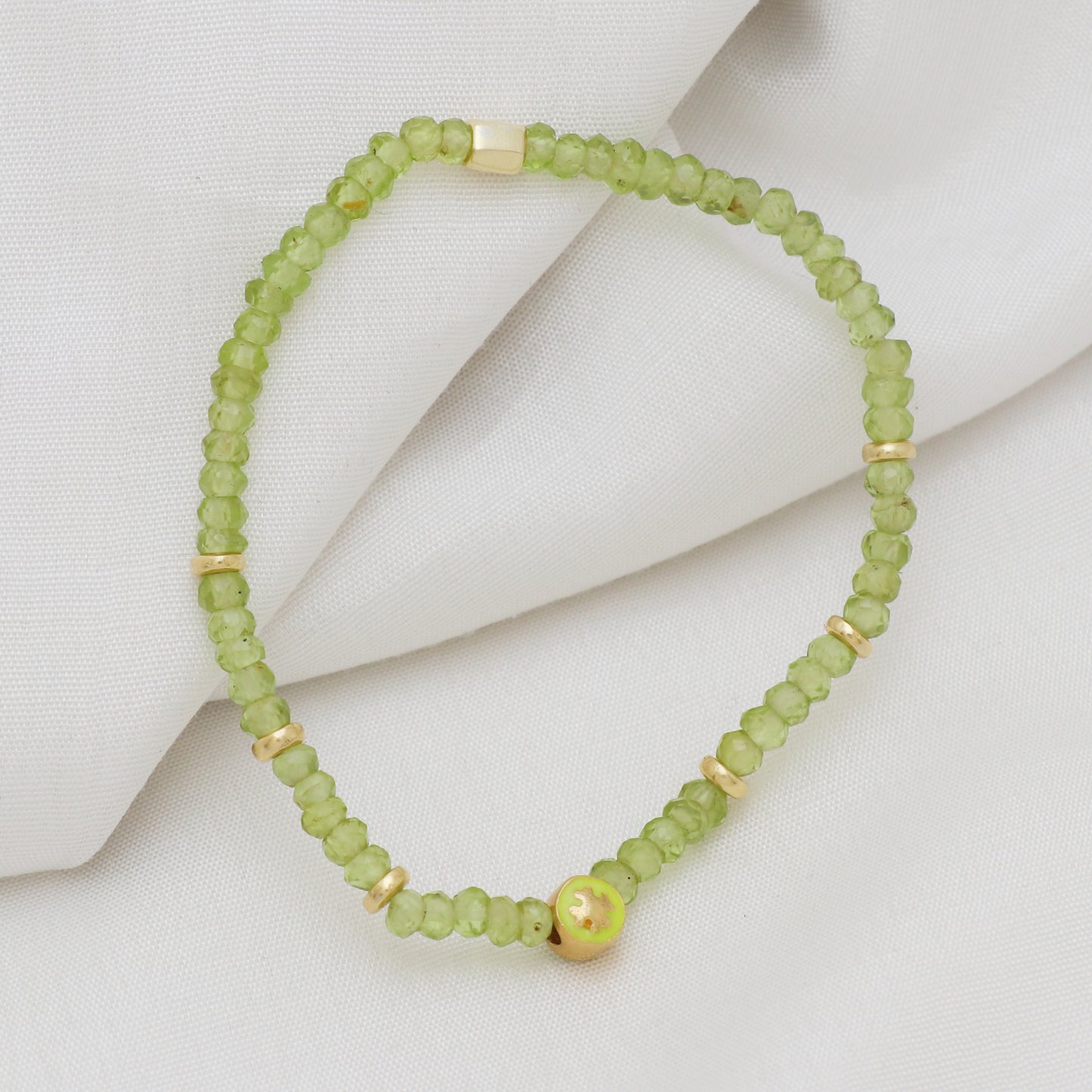 Peridot Flower charm stretch bracelet with green And gold enamel in gold plated 925 sterling silver
