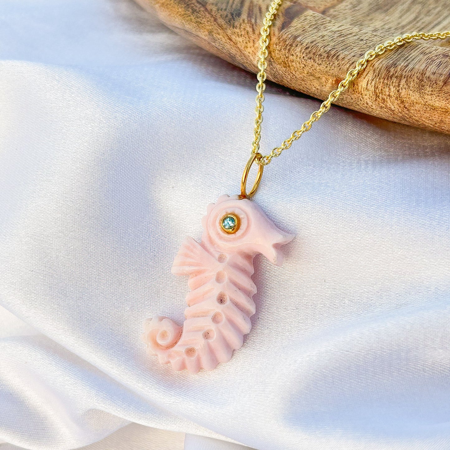 Sea Horse hand-carved pendant in Pink Opal with Blue Topaz gemstone in gold plated Brass chain necklace