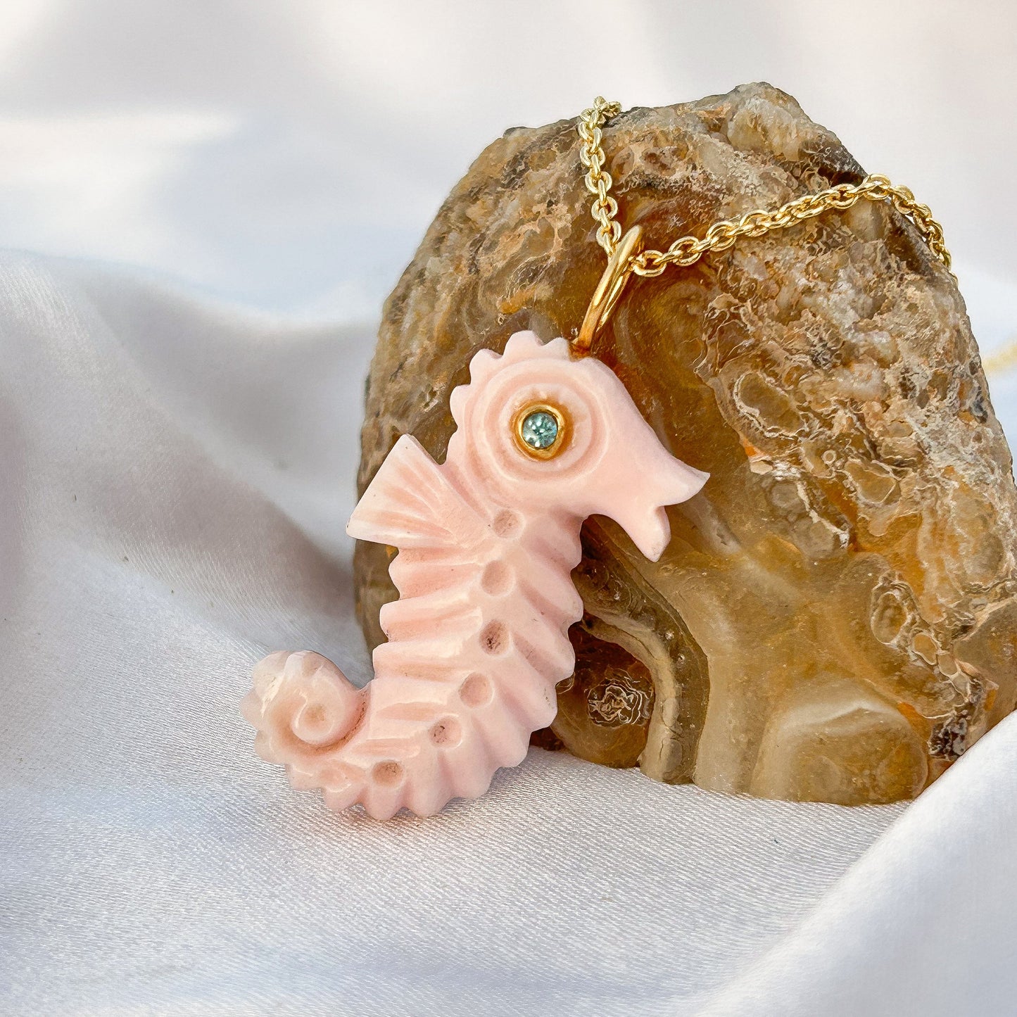 Sea Horse hand-carved pendant in Pink Opal with Blue Topaz gemstone in gold plated Brass chain necklace