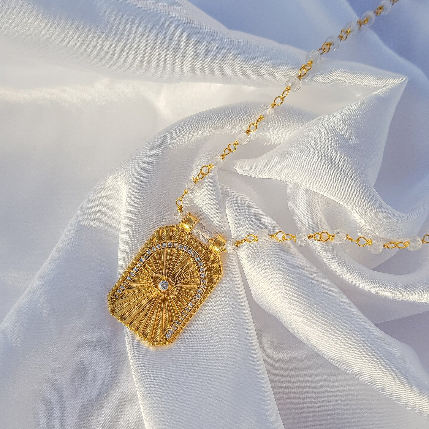 Clear Quartz beaded necklace with Evil Eye Tarot Card charm and zircon stones in 22k gold plated 925 sterling silver