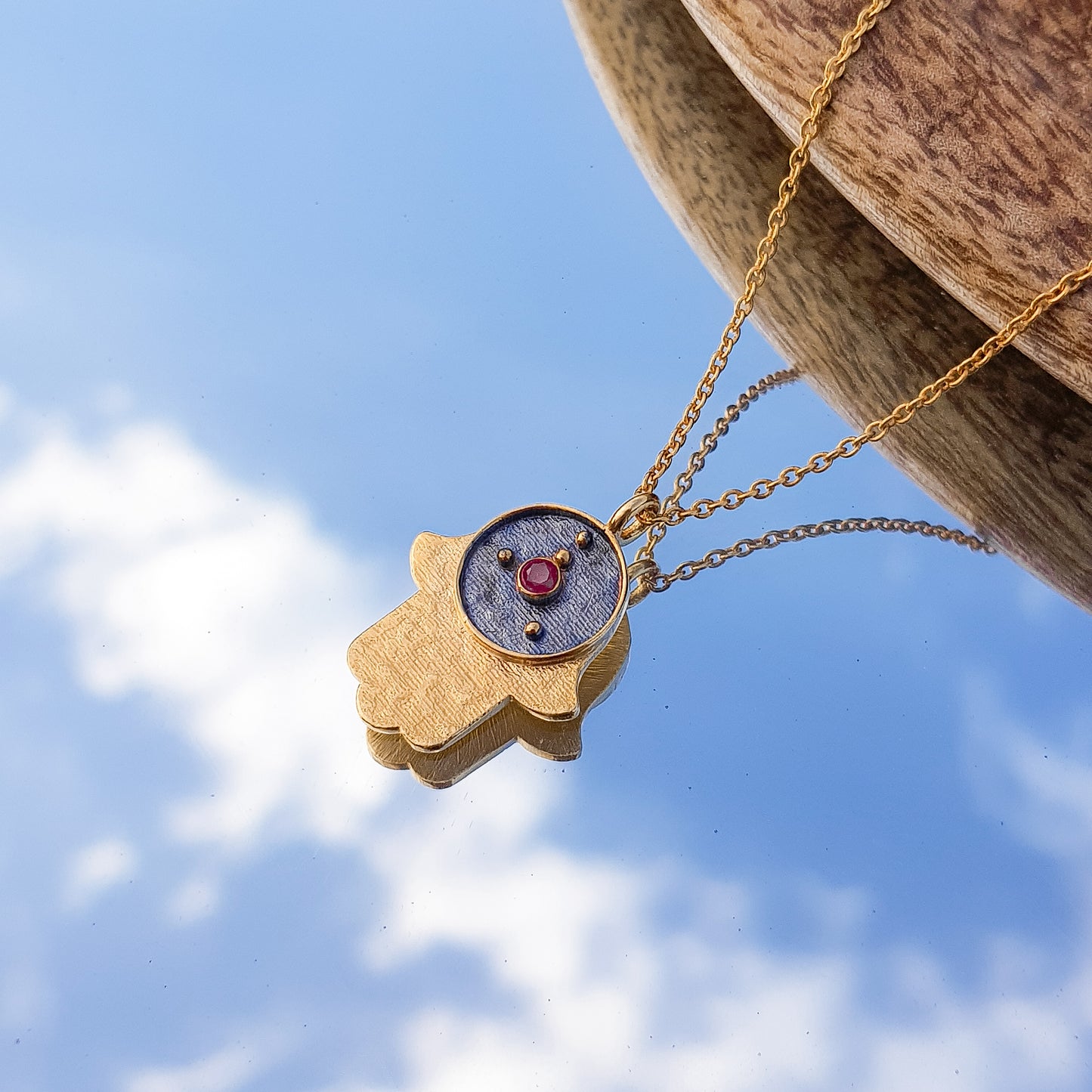 Cancer Zodiac Constellation chain necklace with Hamsa Charm and ruby birthstone in two tone black rhodium and 22k gold plated 925 sterling silver