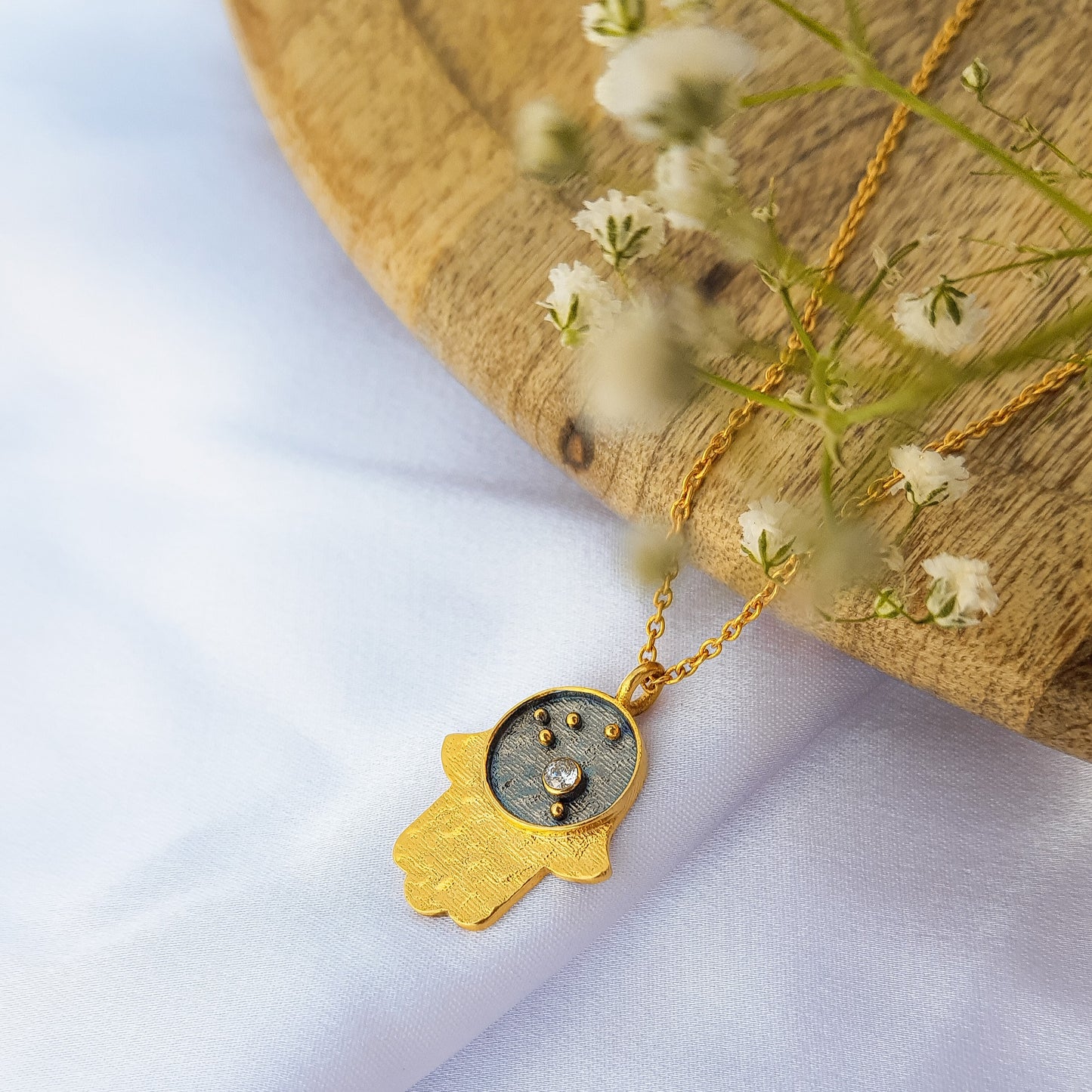 Aries Zodiac Constellation chain necklace with Hamsa Charm and Zircon birthstone in two tone black rhodium and 22k gold plated 925 sterling silver