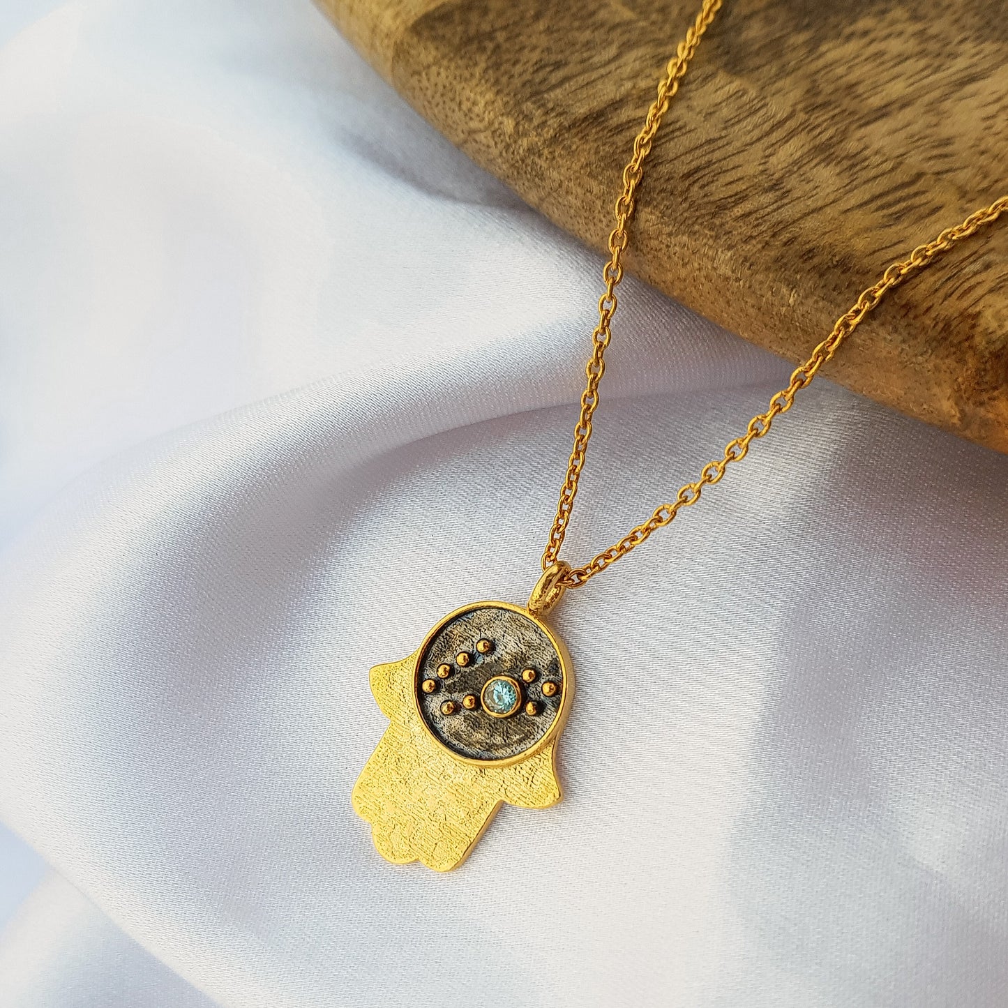 Pisces Zodiac Constellation chain necklace with Hamsa Charm and Aquamarine birthstone in two tone black rhodium and 22k gold plated 925 sterling silver