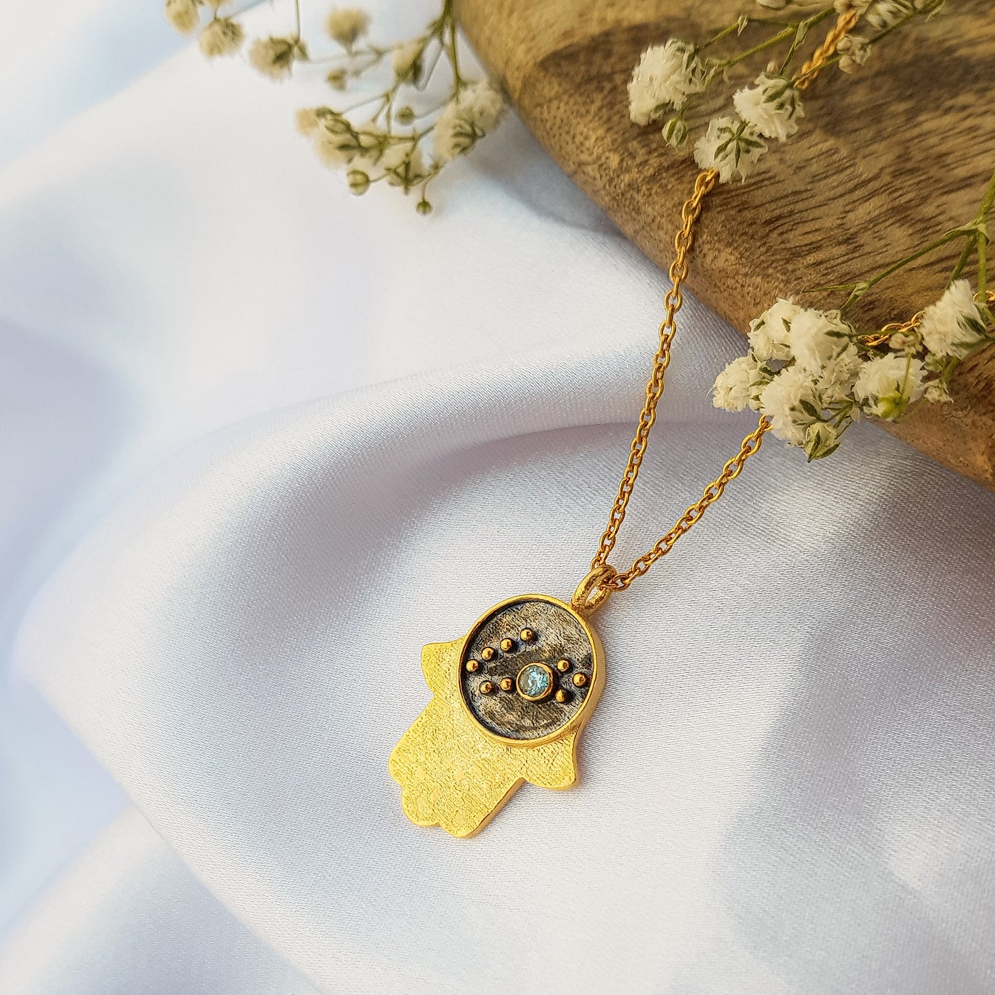 Pisces Zodiac Constellation chain necklace with Hamsa Charm and Aquamarine birthstone in two tone black rhodium and 22k gold plated 925 sterling silver