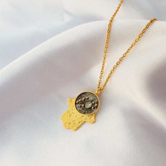 Pisces Zodiac Constellation chain necklace with Hamsa Charm and Aquamarine birthstone in two tone black rhodium and 22k gold plated 925 sterling silver