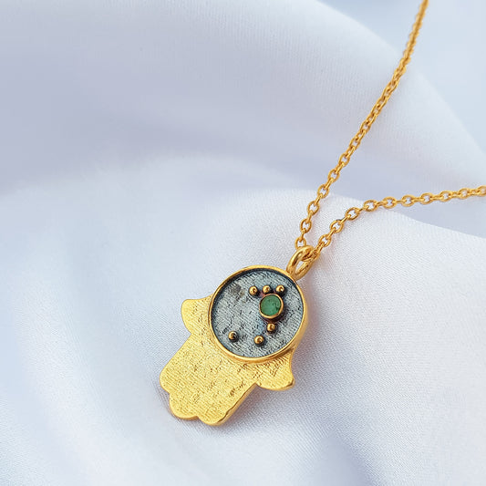Taurus Zodiac Constellation chain necklace with Hamsa Charm and Emerald birthstone in two tone black rhodium and 22k gold plated 925 sterling silver