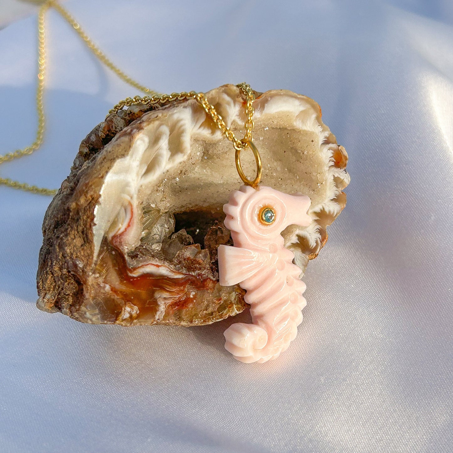 Sea Horse hand-carved pendant in Pink Opal with Blue Topaz gemstone in gold plated Brass chain necklace