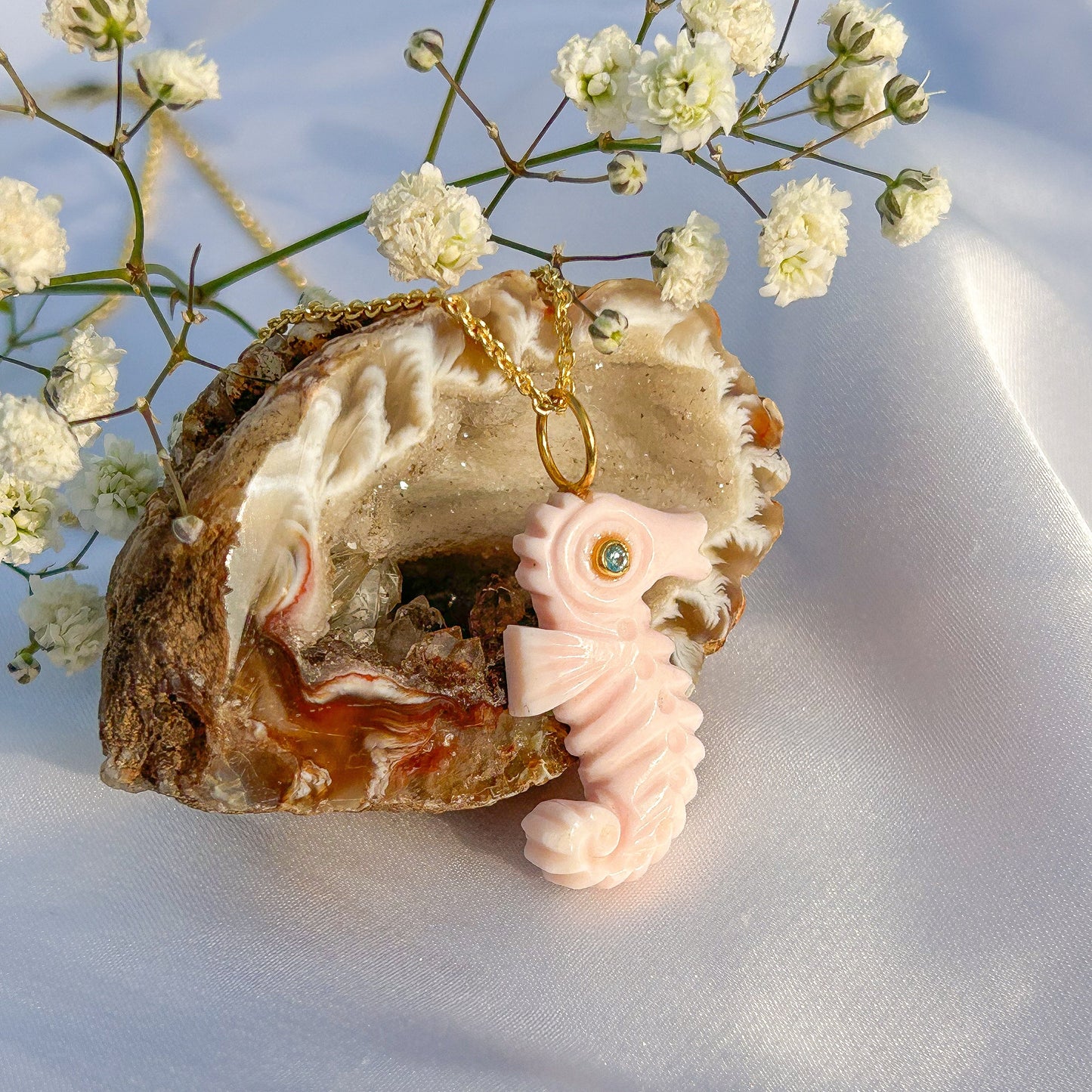 Sea Horse hand-carved pendant in Pink Opal with Blue Topaz gemstone in gold plated Brass chain necklace