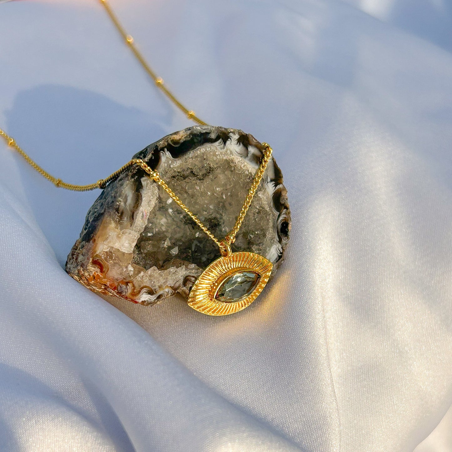 Evil Eye ball chain necklace with Blue Topaz gemstones in gold plated Brass