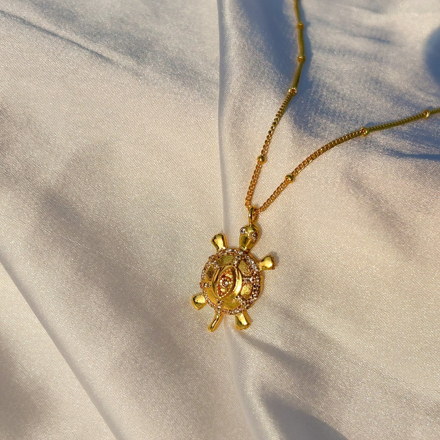 Evil Eye Turtle charm ball chain necklace with zircon gemstones in gold plated Brass