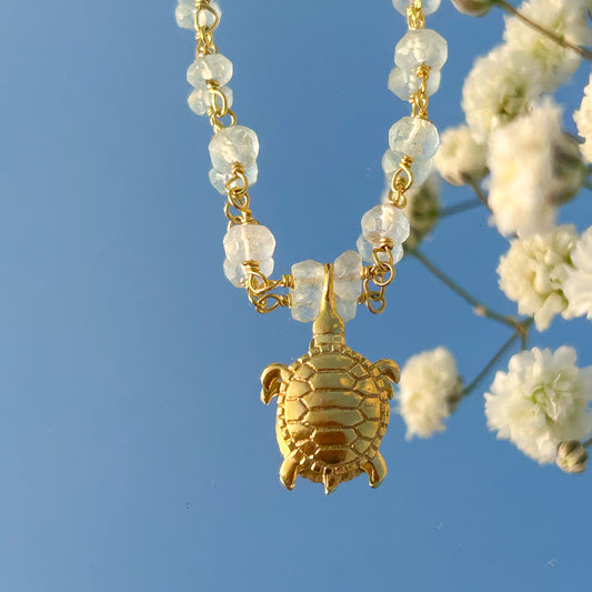 Aquamarine beaded necklace with Turtle charm in gold plated Brass