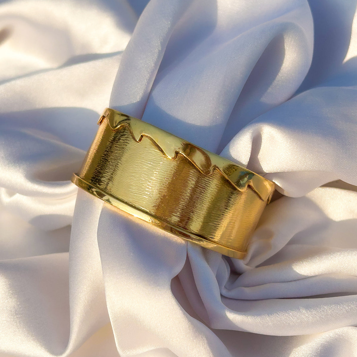Brushed Finish Wave Edge Detail Broad Bangle in Gold Plated Brass