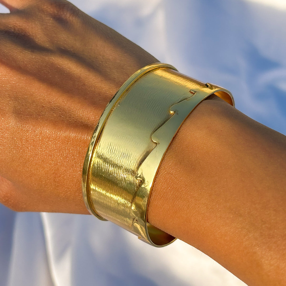 Brushed Finish Wave Edge Detail Broad Bangle in Gold Plated Brass