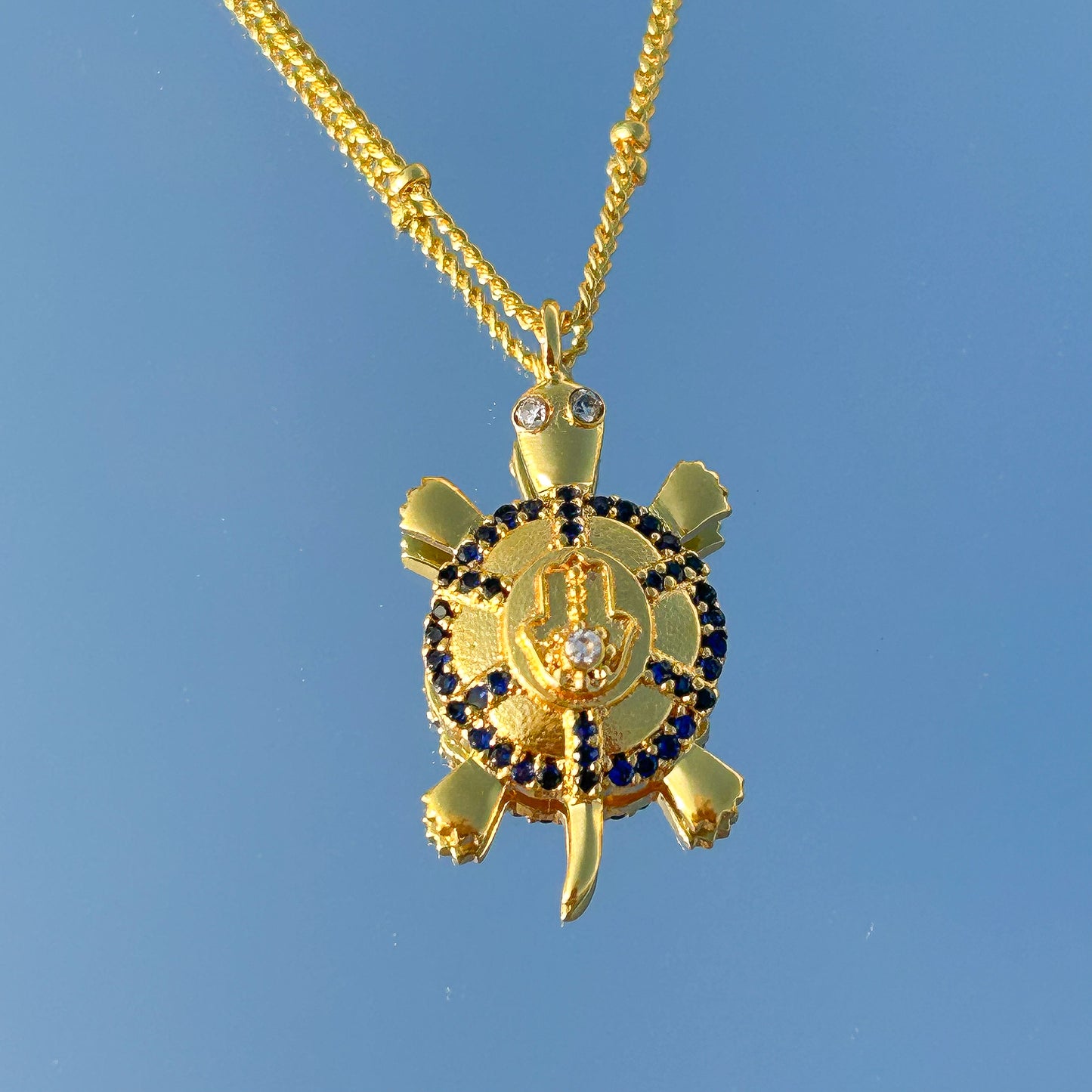 Hamsa Turtle charm ball chain necklace with green, blue and white zircon gemstones in gold plated Brass