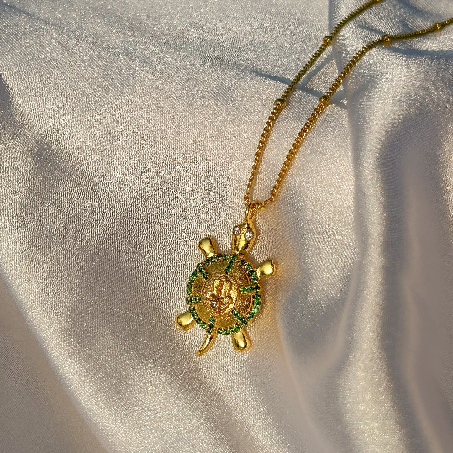 Hamsa Turtle charm ball chain necklace with green, blue and white zircon gemstones in gold plated Brass