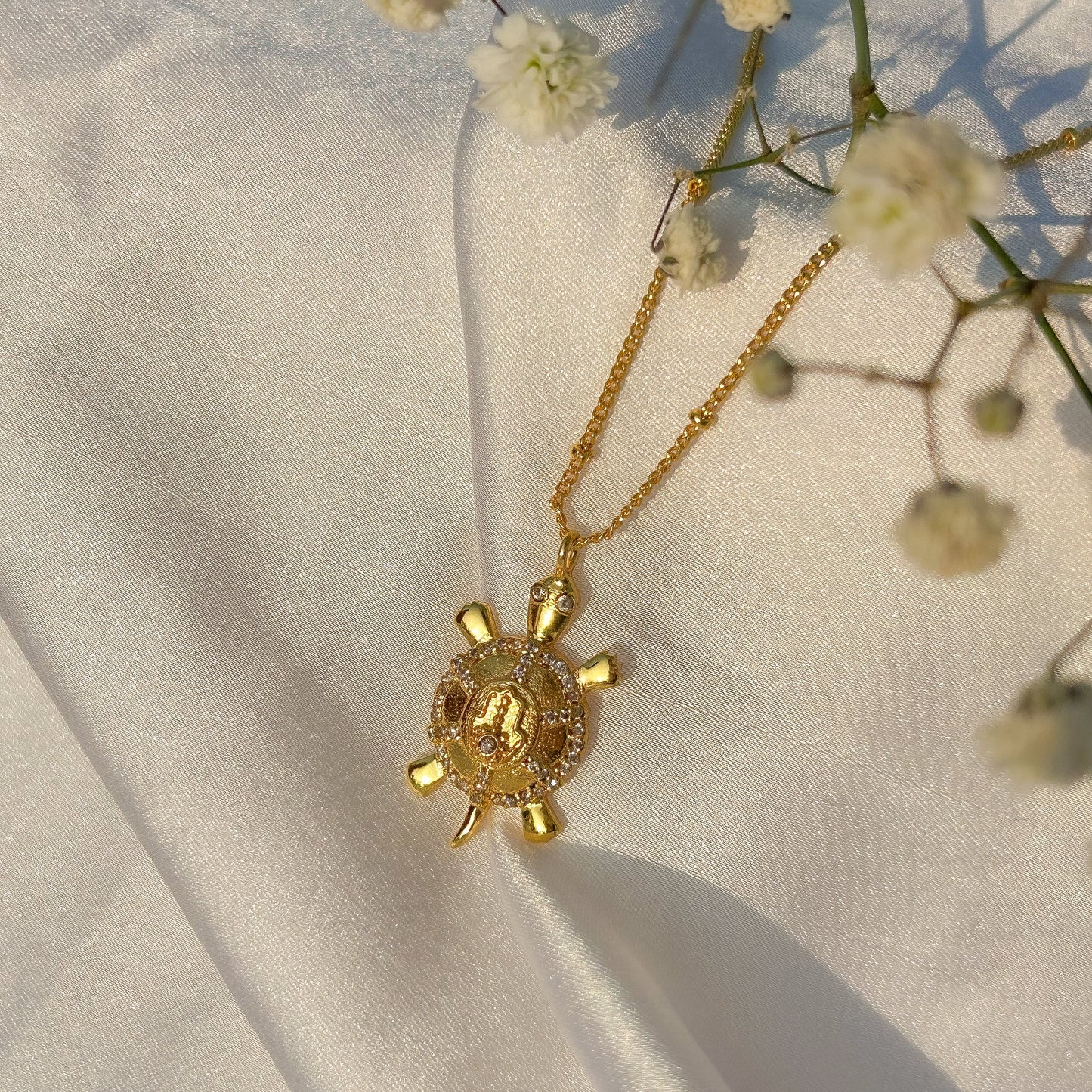 Hamsa Turtle charm ball chain necklace with green, blue and white zircon gemstones in gold plated Brass