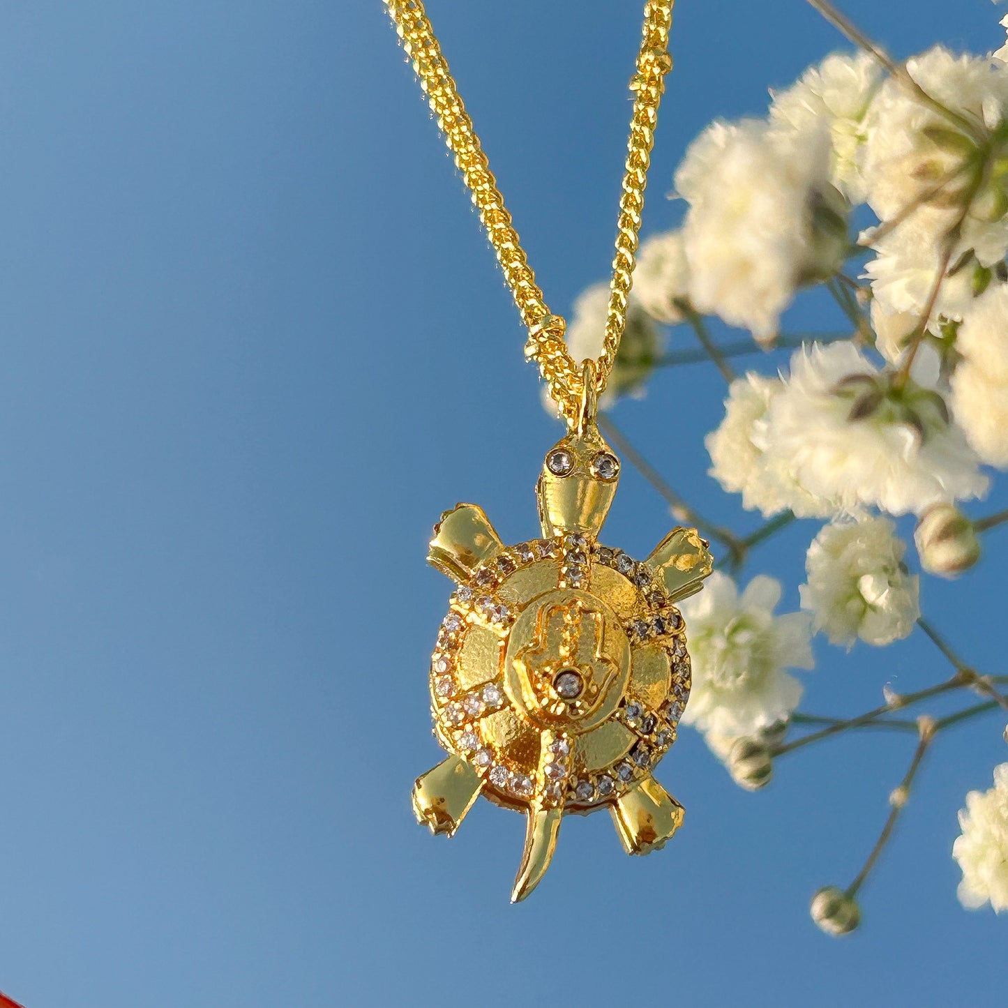 Hamsa Turtle charm ball chain necklace with green, blue and white zircon gemstones in gold plated Brass